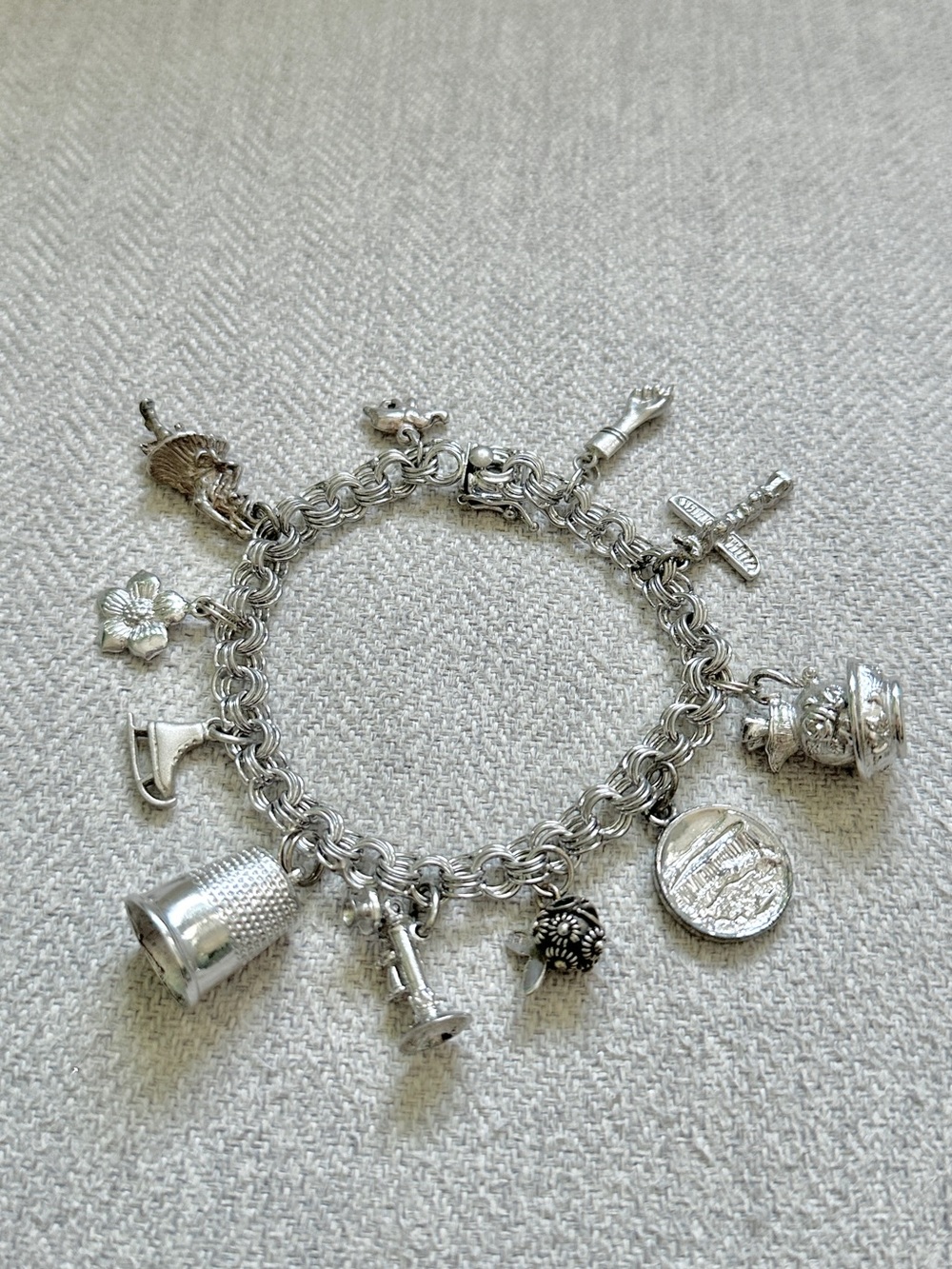 vintage sterling silver charm bracelet with 11 charms